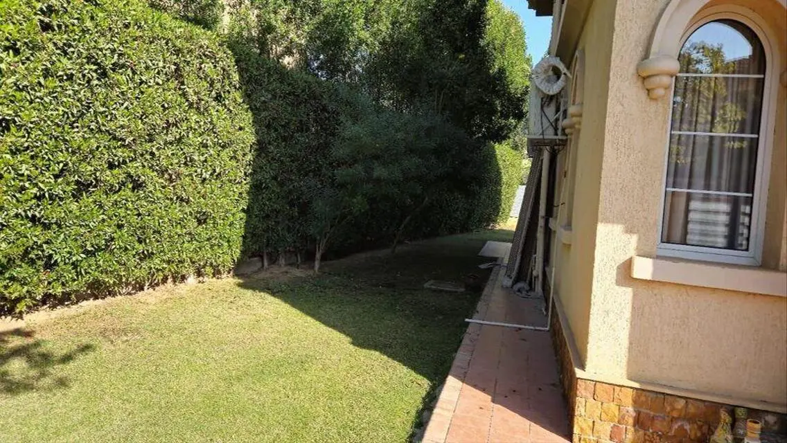 Luxury Apartment with Private Garden in Prime Location