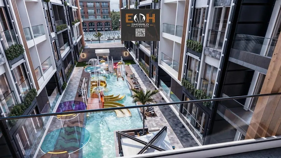Luxury Apartment with Balcony and Shared Pool in the Heart of the City