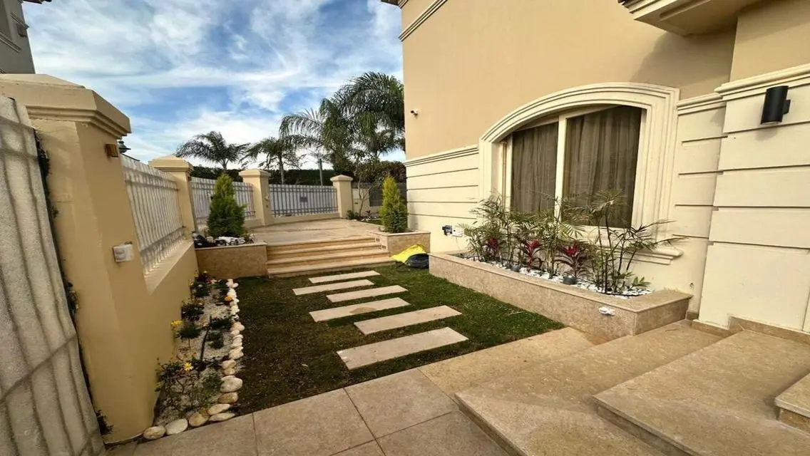 Luxurious Home with Private Pool and Garden