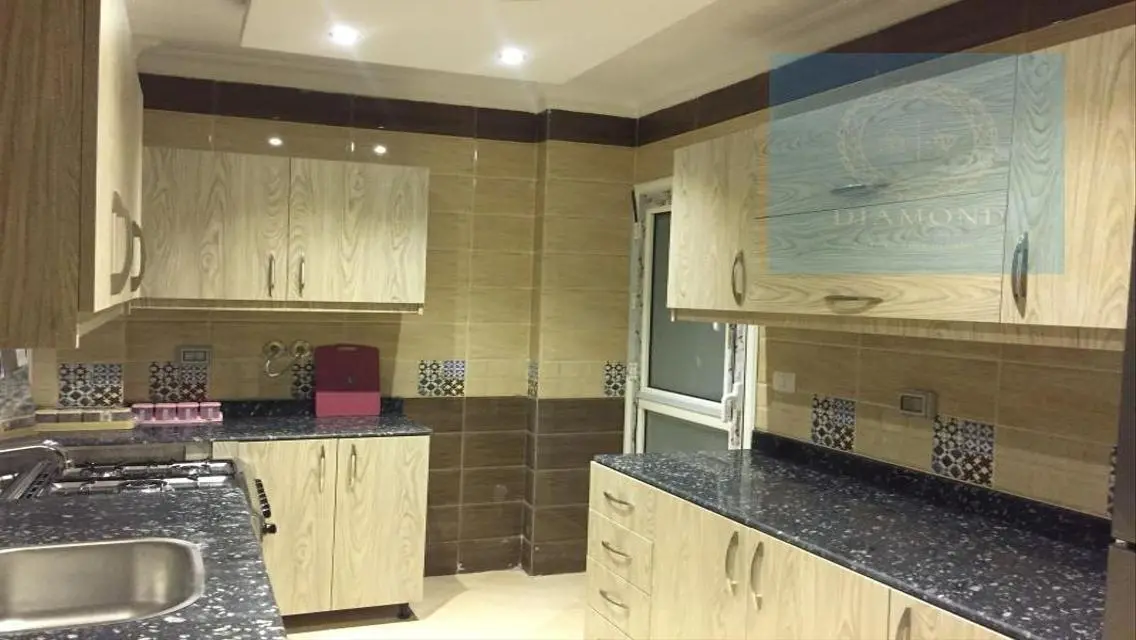 شقه فندقيه اول سكن بحديقه خاصه امام المولات في B10