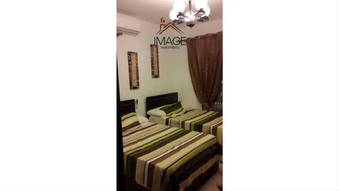 Luxurious Villa with Private Garden and Shared Pool for Sale