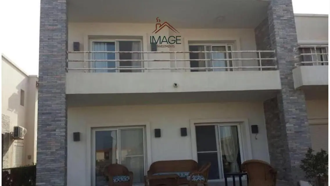 Luxurious Villa with Private Garden and Shared Pool for Sale