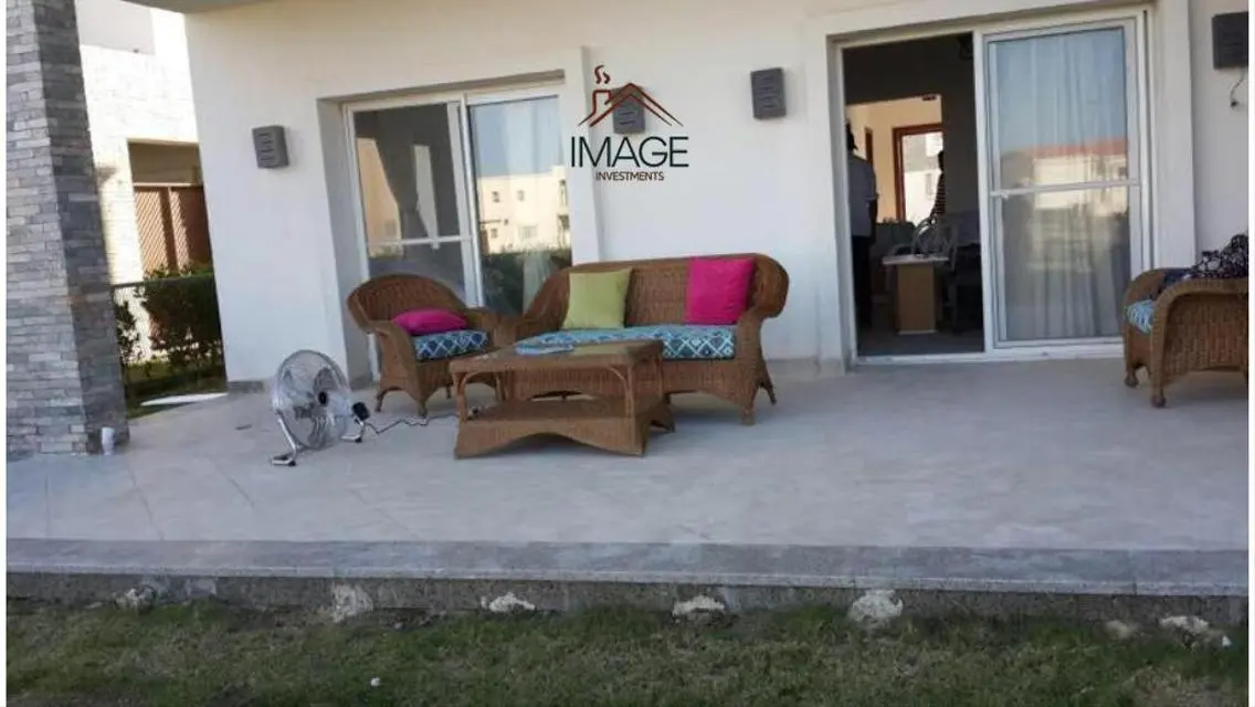 Luxurious Villa with Private Garden and Shared Pool for Sale