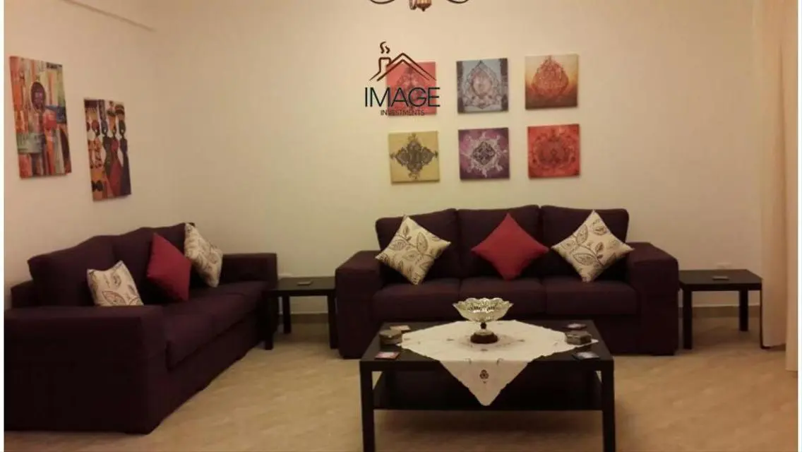 Luxurious Villa with Private Garden and Shared Pool for Sale