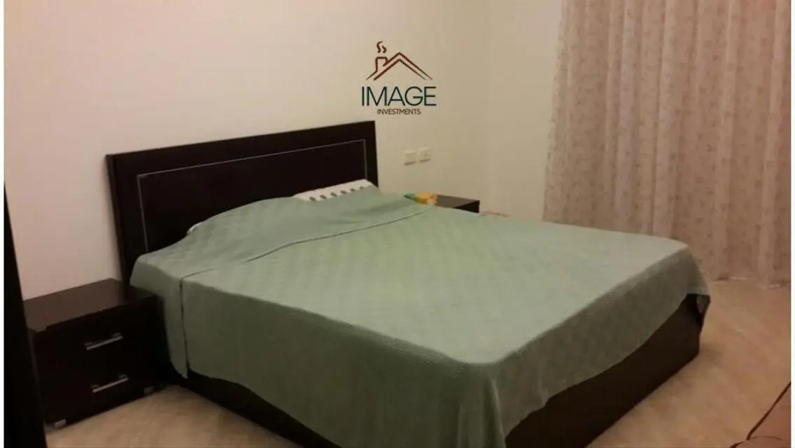 Luxurious Villa with Private Garden and Shared Pool for Sale