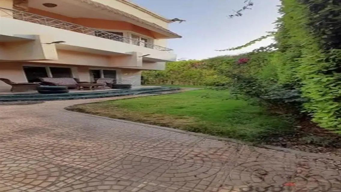Luxury Villa with Private Garden and Covered Parking