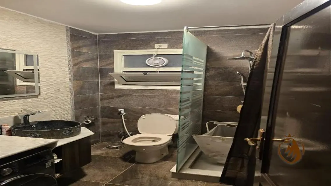 Luxurious Apartment with Private Garden for Sale in Rehab City