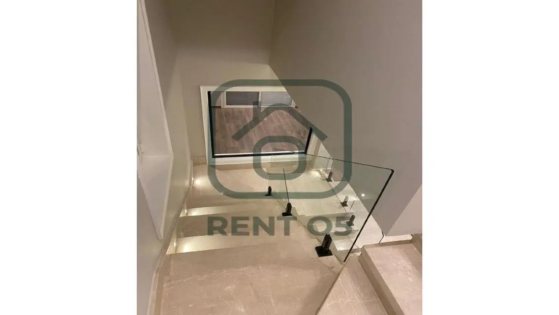 Luxurious Apartment for Sale in AUC - 4 Bedrooms with Private Garden
