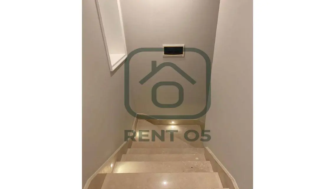 Luxurious Apartment for Sale in AUC - 4 Bedrooms with Private Garden