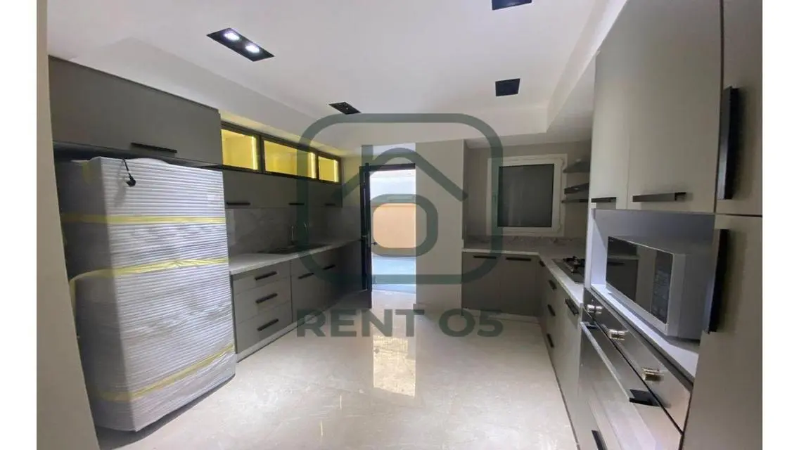 Luxurious Apartment for Sale in AUC - 4 Bedrooms with Private Garden