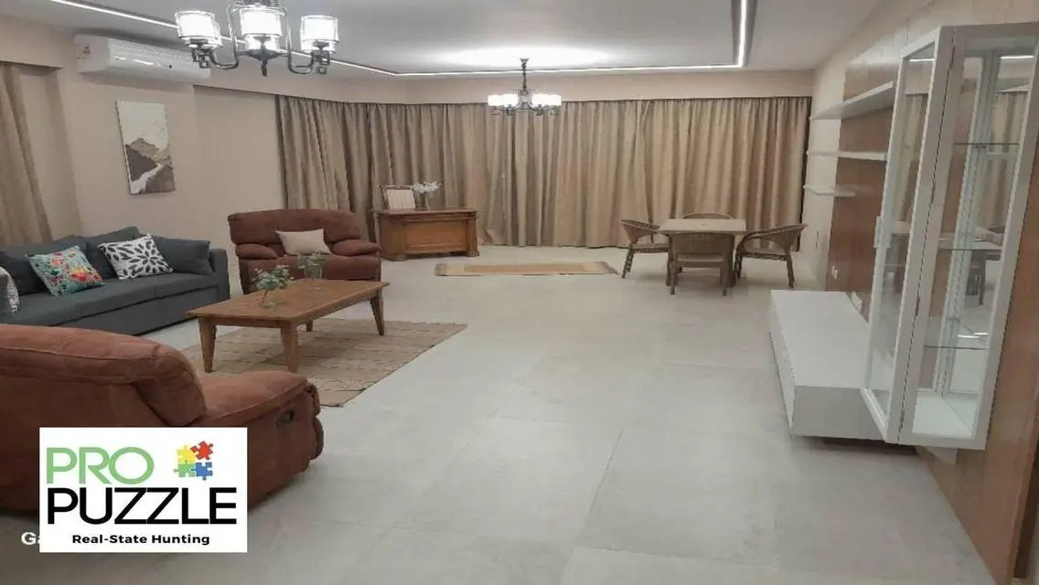 Luxury Apartment in AUC with Private Garden and Shared Pool