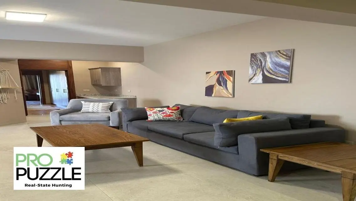 Luxury Apartment in AUC with Private Garden and Shared Pool