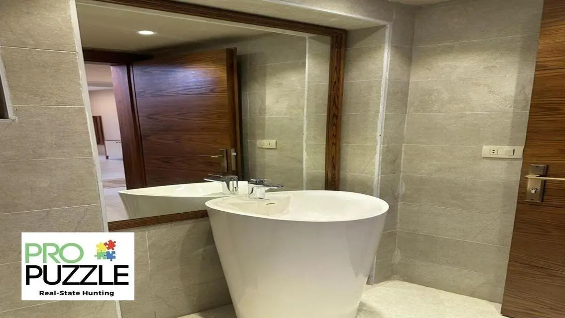 Luxury Apartment in AUC with Private Garden and Shared Pool