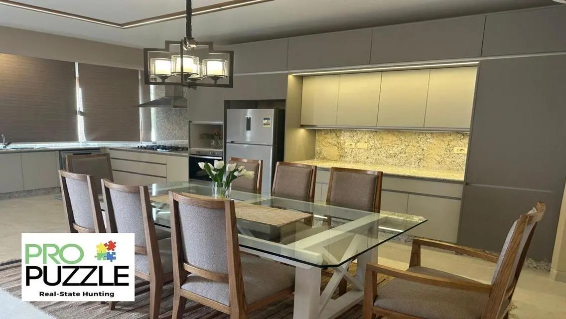 Luxury Apartment in AUC with Private Garden and Shared Pool