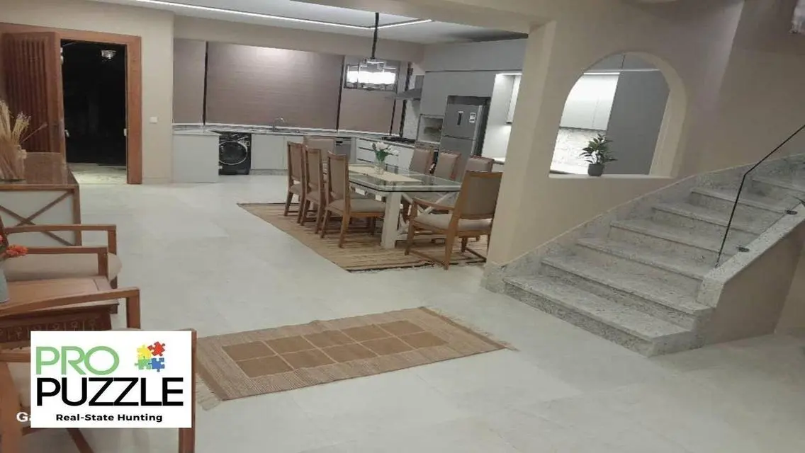 Luxury Apartment in AUC with Private Garden and Shared Pool