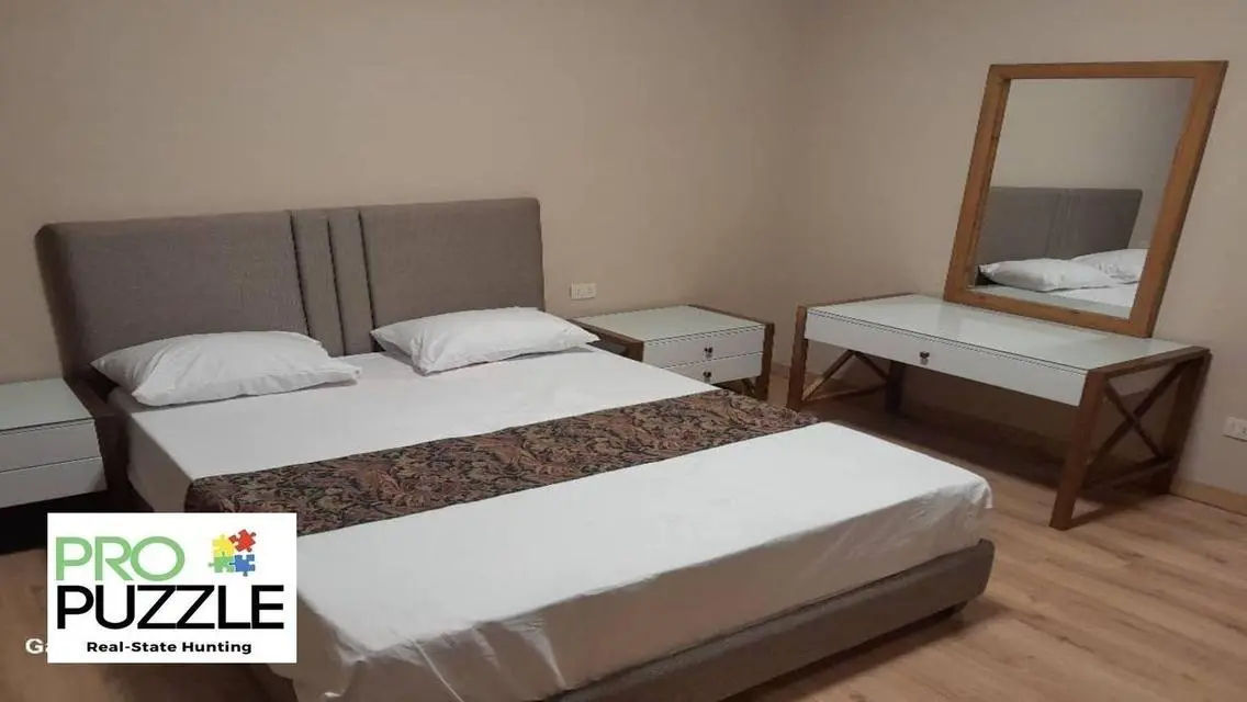 Luxury Apartment in AUC with Private Garden and Shared Pool
