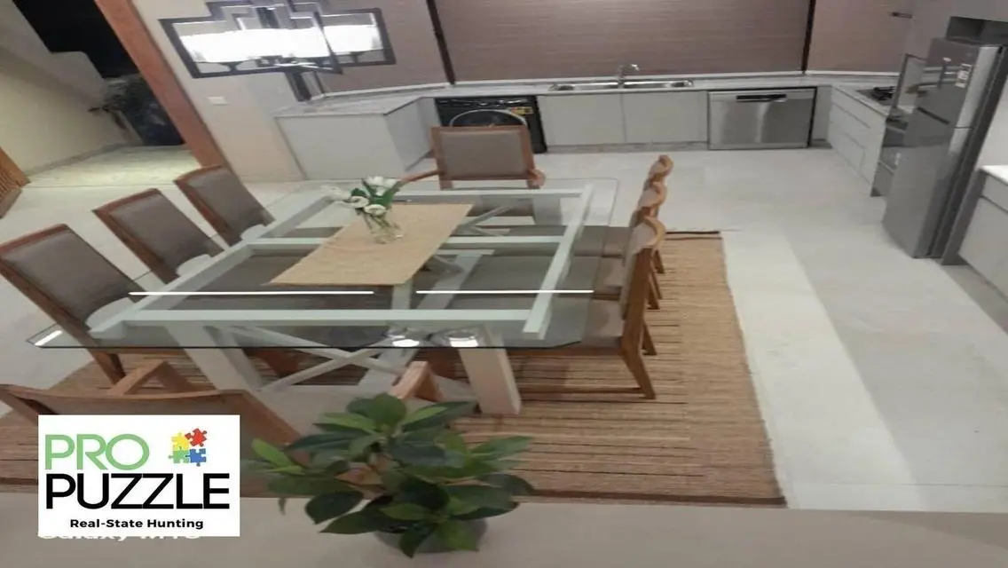 Luxury Apartment in AUC with Private Garden and Shared Pool