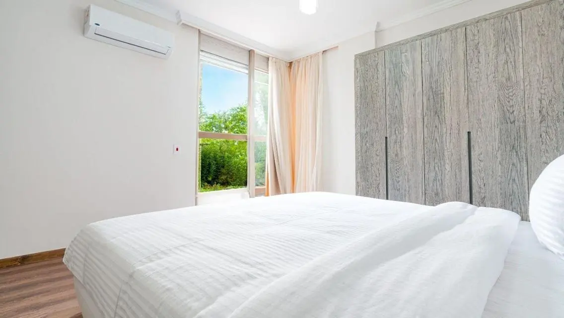 Stunning 3-Bedroom Apartment with Private Garden and Shared Pool