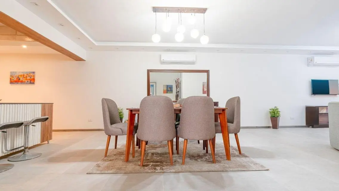 Stunning 3-Bedroom Apartment with Private Garden and Shared Pool