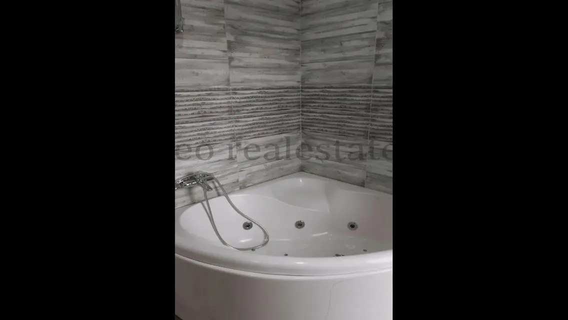 Luxury Apartment with Private Garden in Prime Location