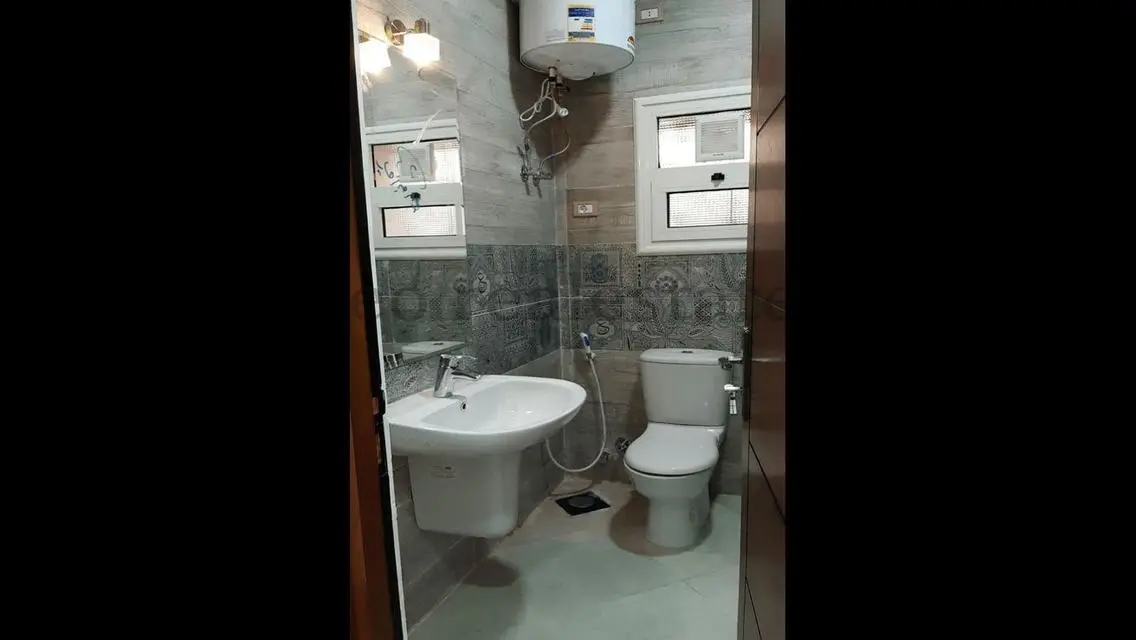 Luxury Apartment with Private Garden in Prime Location
