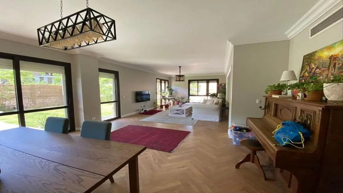Luxury Apartment with Private Garden and Various Amenities