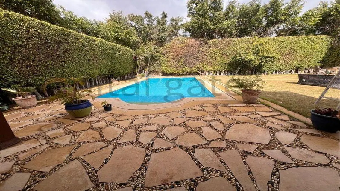 Luxury Apartment with Private Garden and Pool