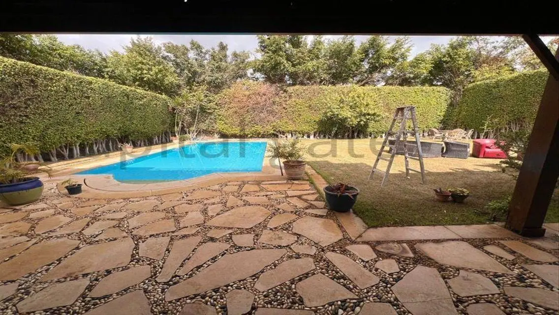 Luxury Apartment with Private Garden and Pool