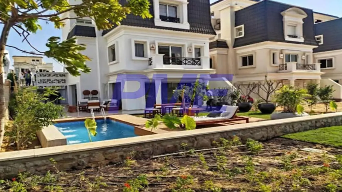 Luxurious Property with Private Garden and Balcony for Sale