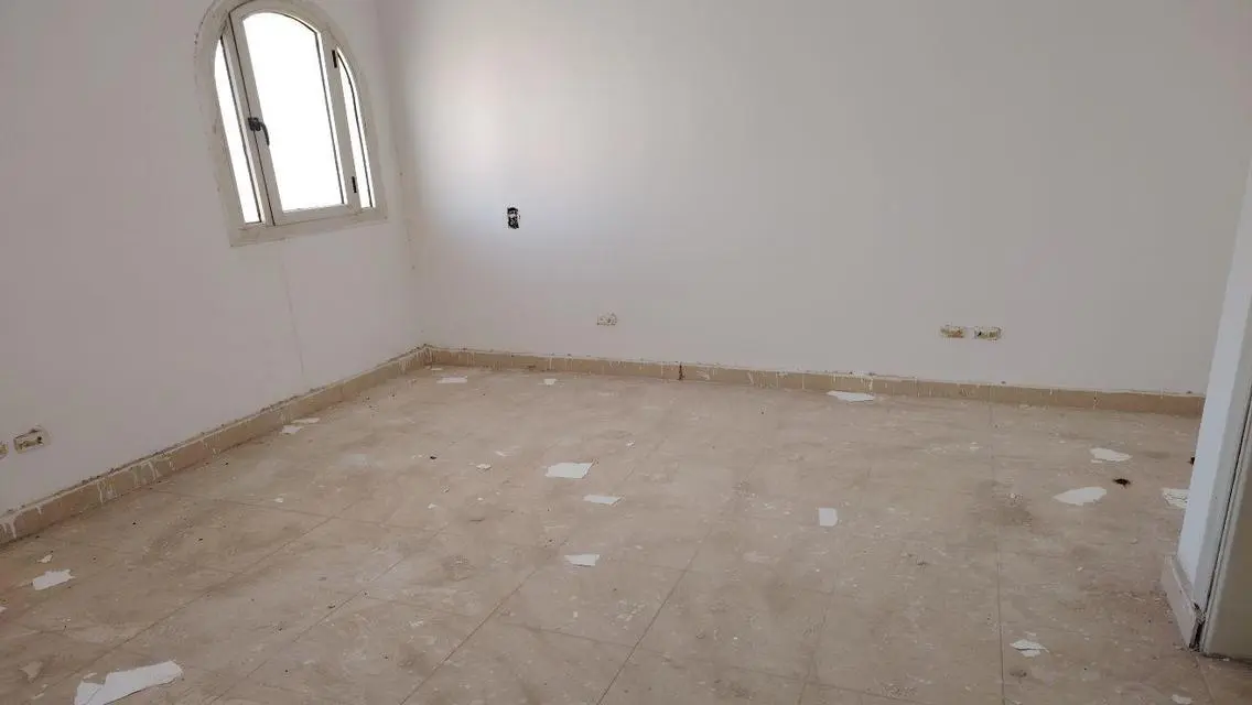 Luxury Apartment with Private Garden and Covered Parking