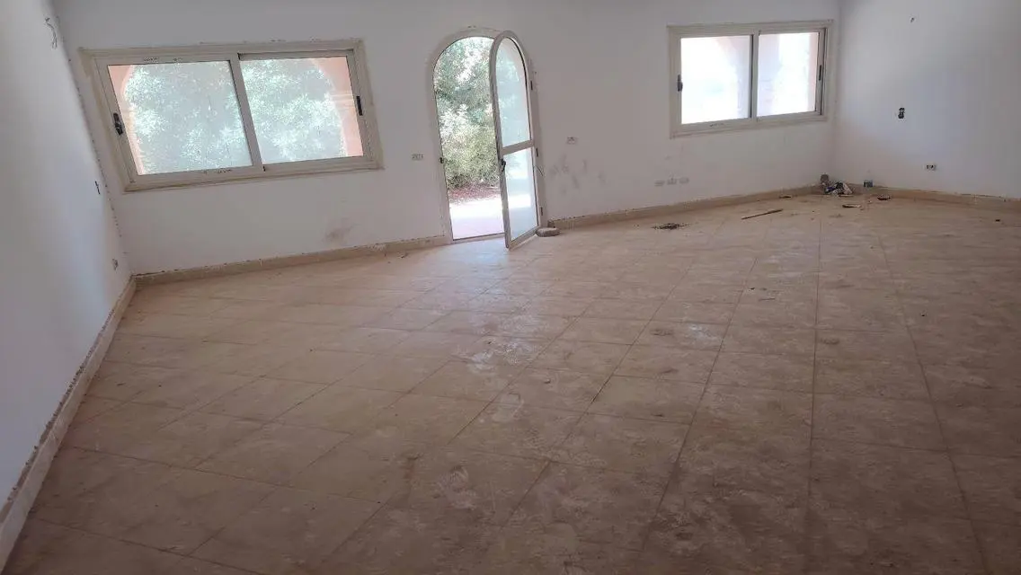 Luxury Apartment with Private Garden and Covered Parking