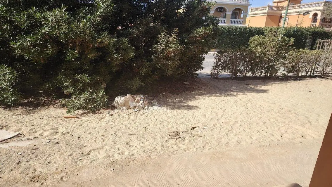 Luxury Apartment with Private Garden and Covered Parking