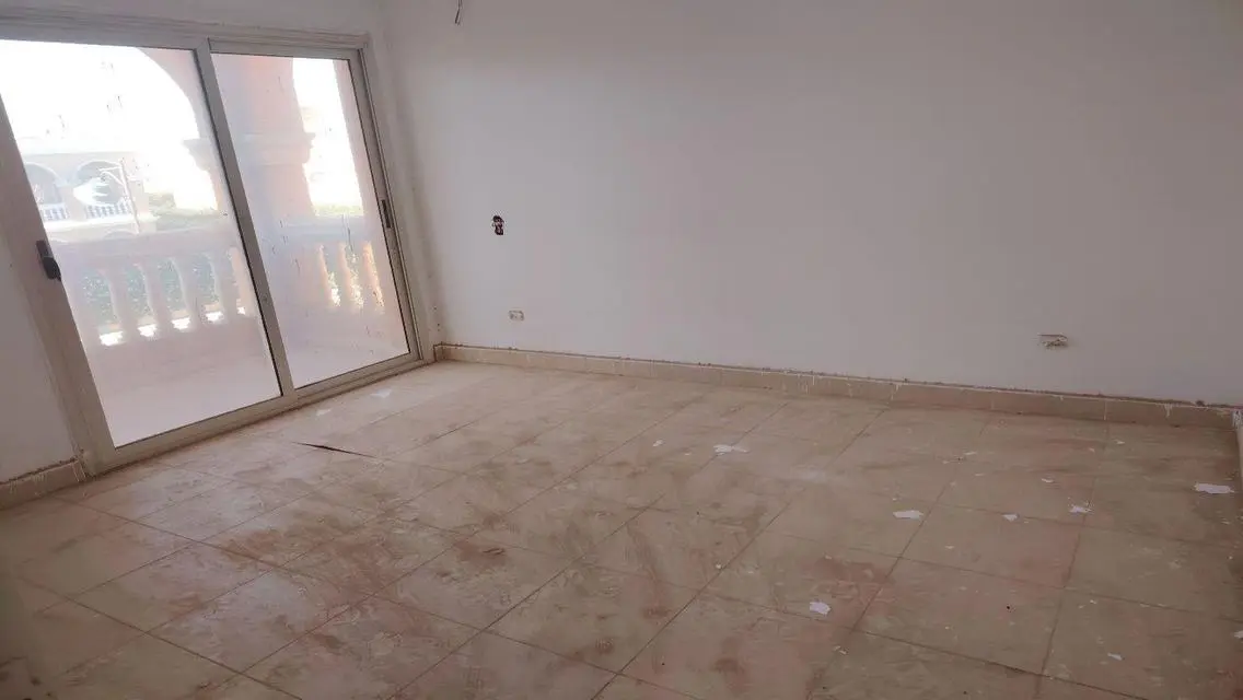 Luxury Apartment with Private Garden and Covered Parking