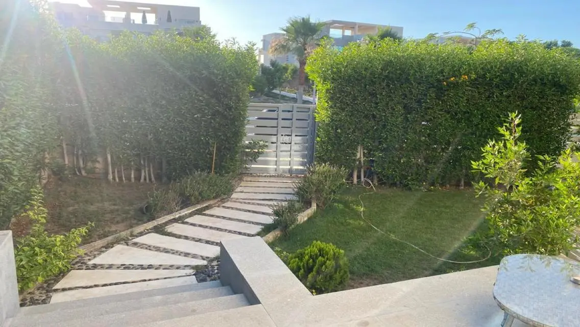 Stunning Apartment for 19000 EGP with Balcony and Private Garden Overlooking Lakes