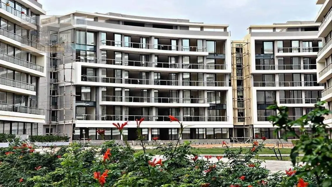 Luxury Apartment with Private Garden and Pool in Prime Location