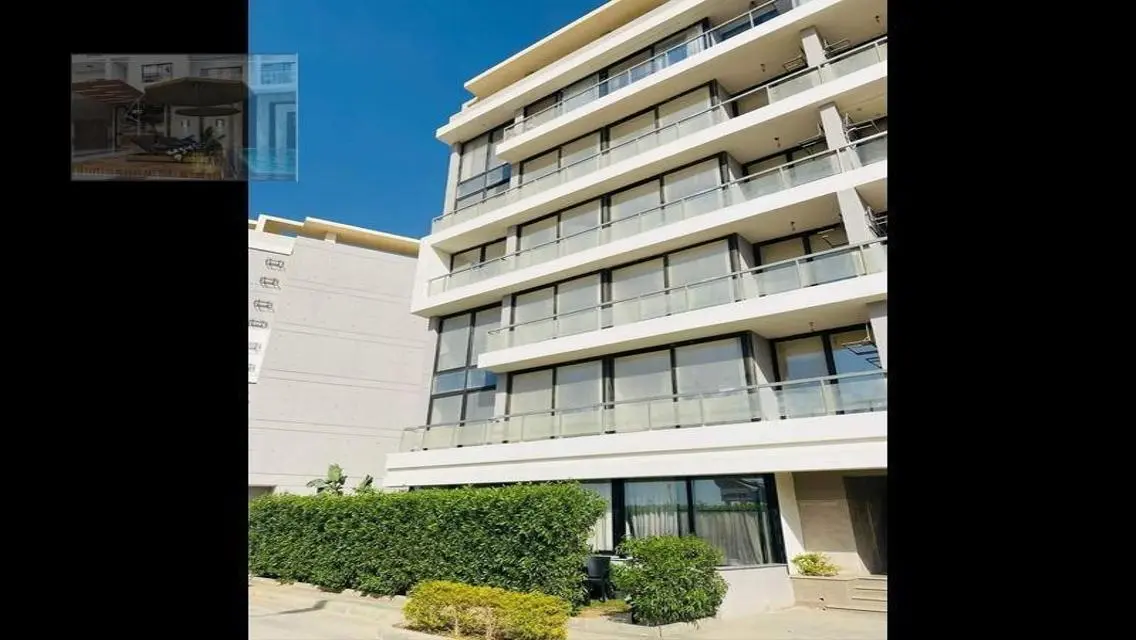 Luxury Apartment with Private Garden and Pool in Prime Location