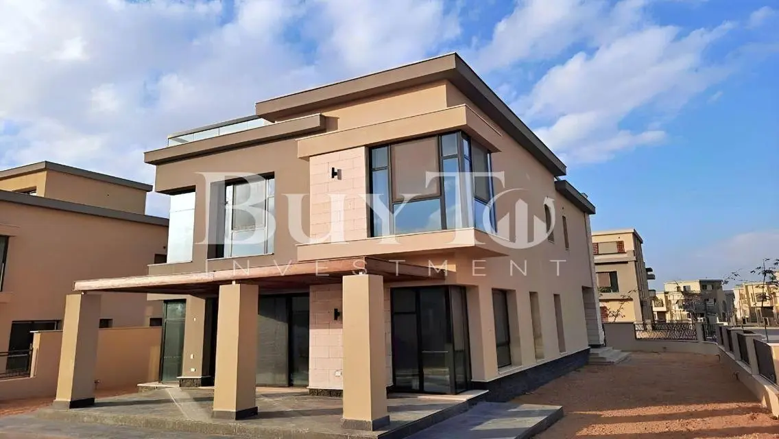 Luxury Villa with Garden and Shared Pool in Prime Location