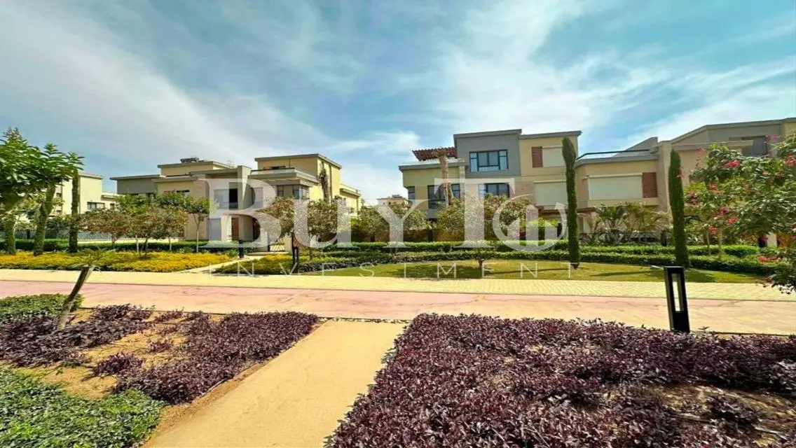 Luxury Villa with Garden and Shared Pool in Prime Location