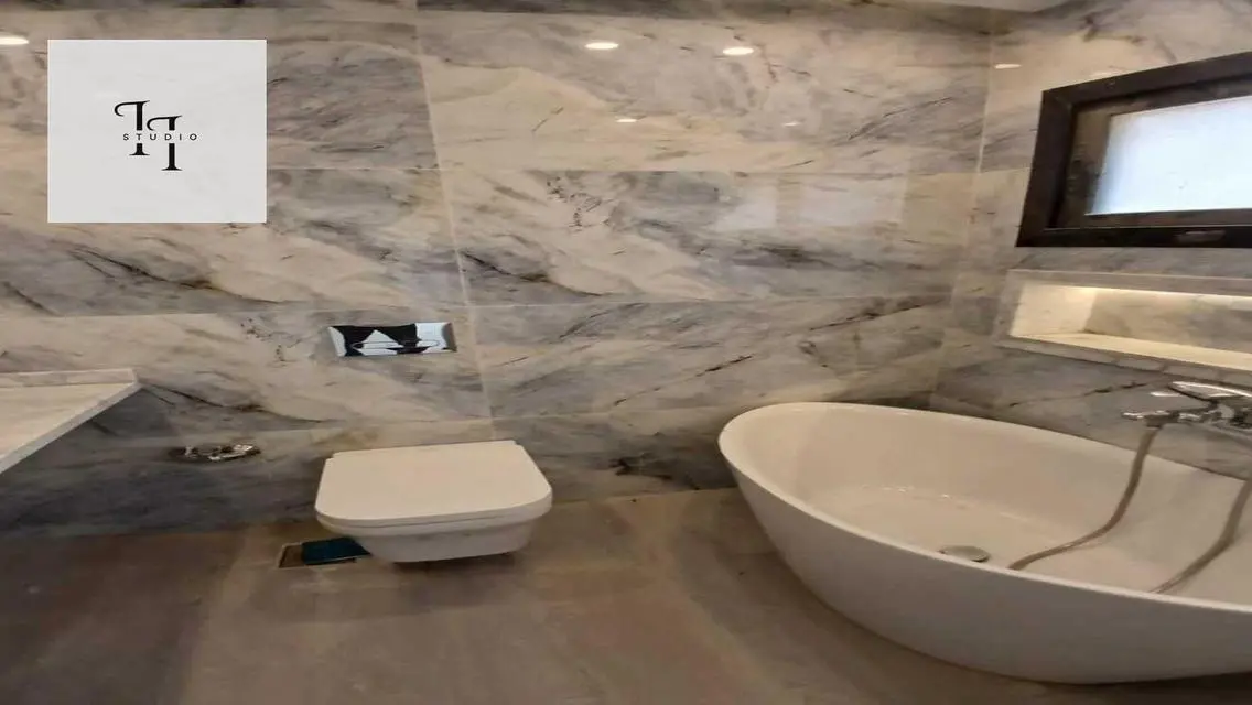 شقة فاخرة في V Residences - 3 غرف نوم مع حديقة خاصة ومسبح
