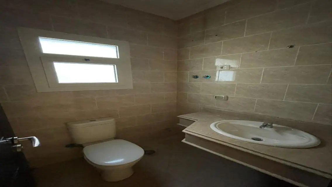 Luxury Apartment with Private Garden and Pool in a Prime Location