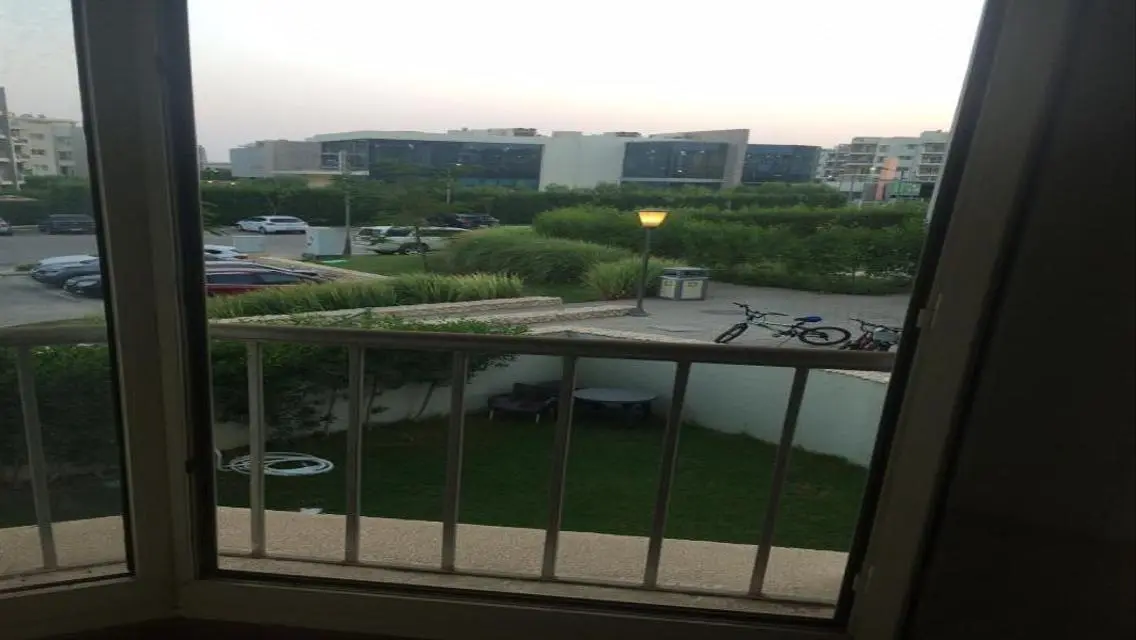 Luxury Apartment with Private Garden and Pool in a Prime Location