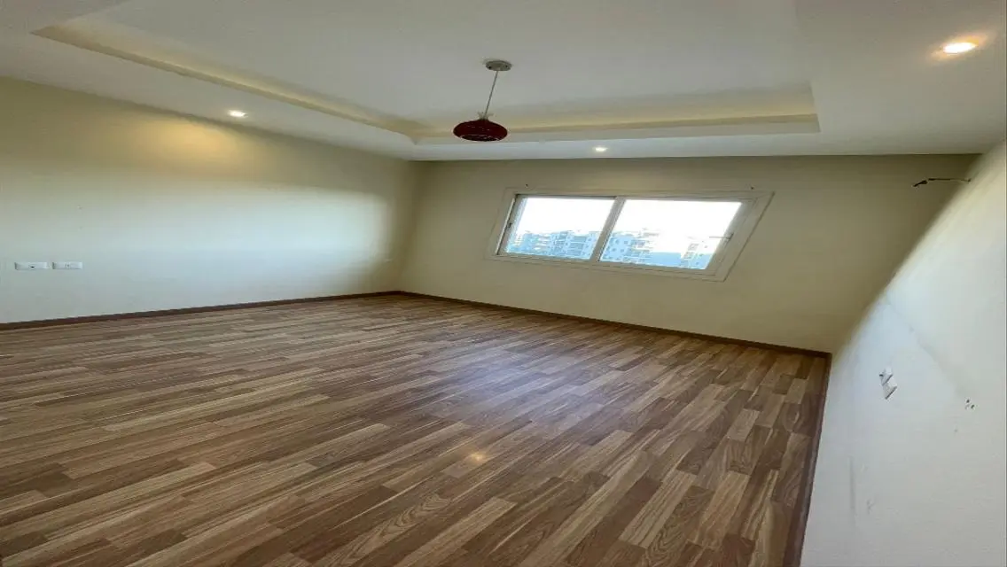 Luxury Apartment with Private Garden and Pool in a Prime Location