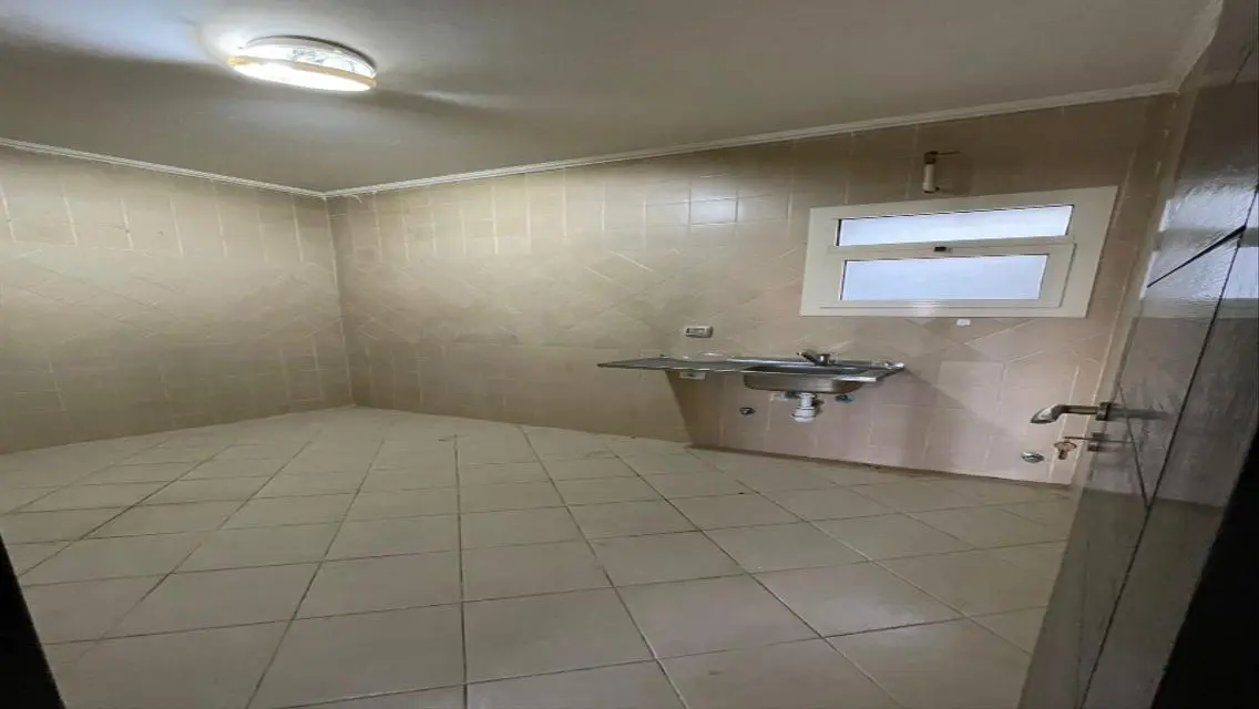 Luxury Apartment with Private Garden and Pool in a Prime Location