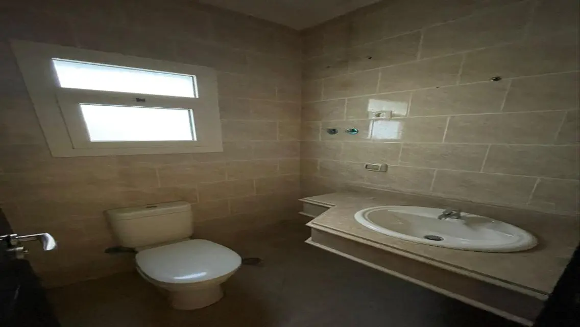 Luxury Apartment with Private Garden and Pool in a Prime Location