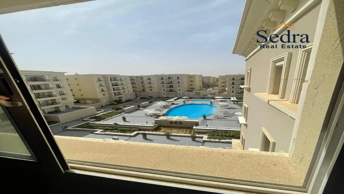 Luxury 4-Bedroom Apartment with Balcony and Shared Pool
