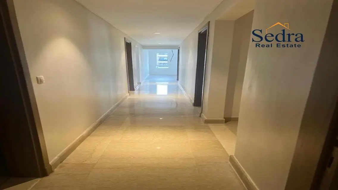 Luxury 4-Bedroom Apartment with Balcony and Shared Pool