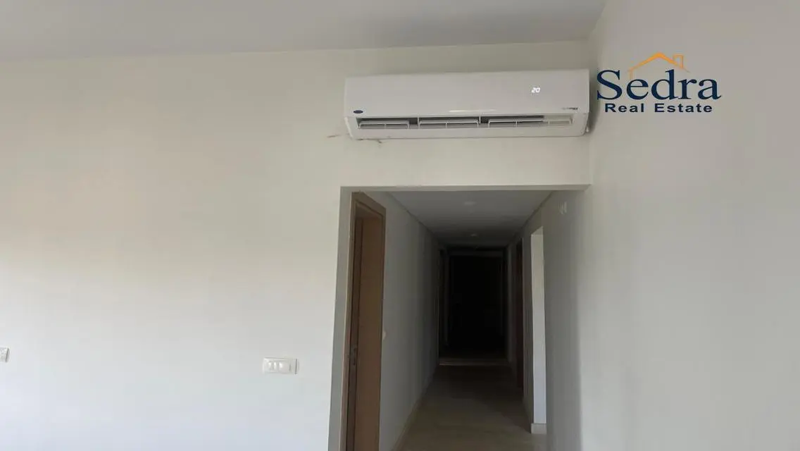 Luxury 4-Bedroom Apartment with Balcony and Shared Pool
