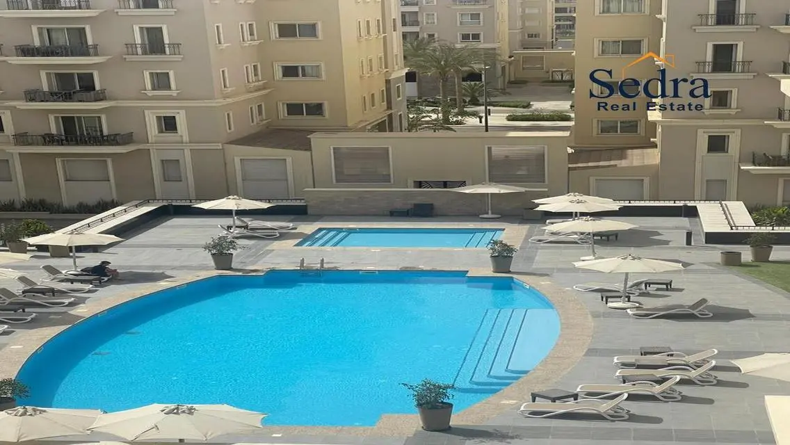 Luxury 4-Bedroom Apartment with Balcony and Shared Pool