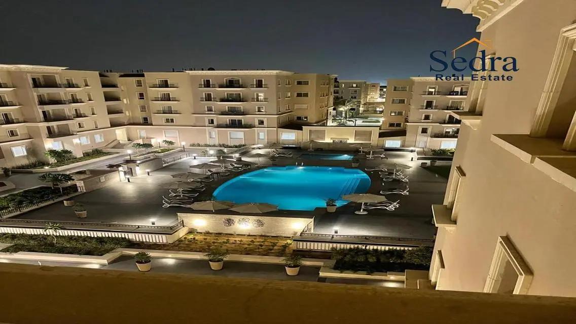 Luxury 4-Bedroom Apartment with Balcony and Shared Pool