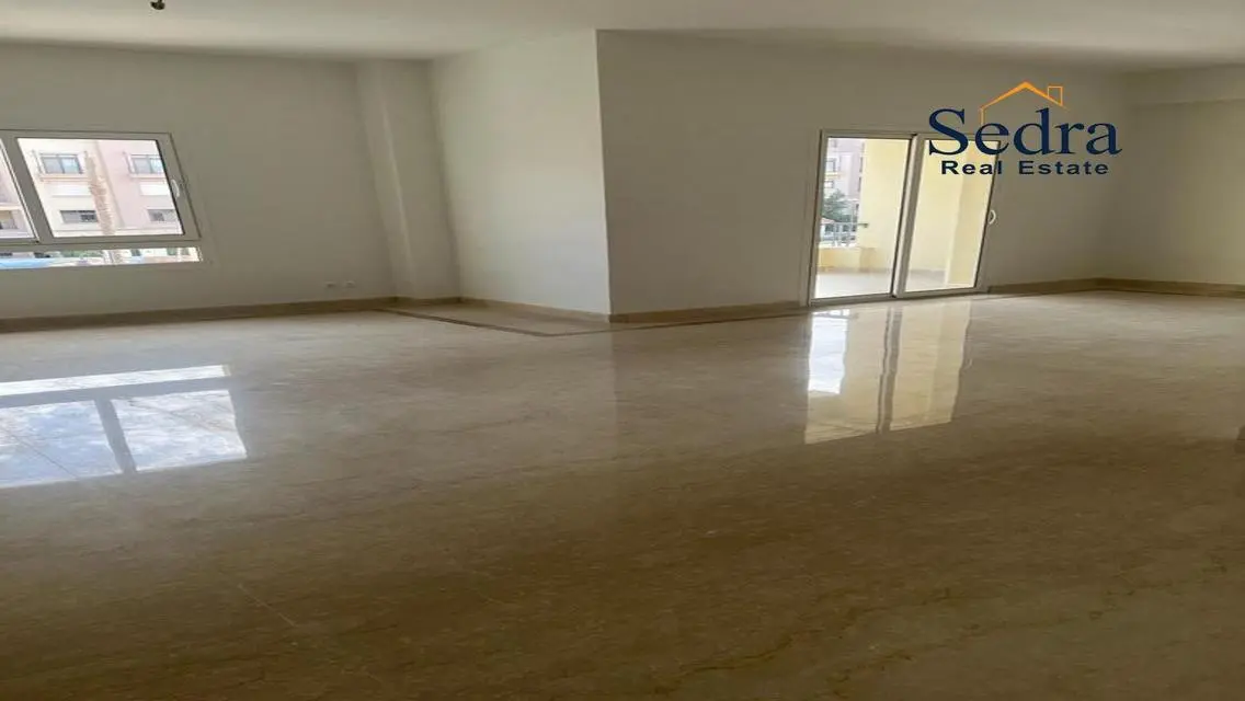 Luxury 4-Bedroom Apartment with Balcony and Shared Pool